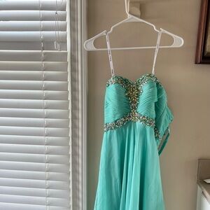 Beautiful turquoise blue dress size 0 and hardly ever worn.